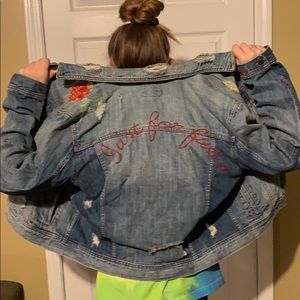 Distressed embroidered jean jacket